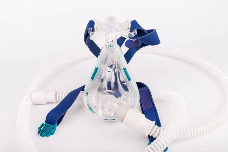 A CPAP hose connected between the machine and mask